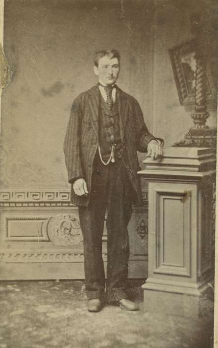 patterned carpet, carte de visite, Olsson, Ann and Jons, history of Iowa, watch chain, vest, Iowa, four in hand tie, Portraits - Individual, Marshalltown, IA, Iowa History, man, sack coat, painted backdrop