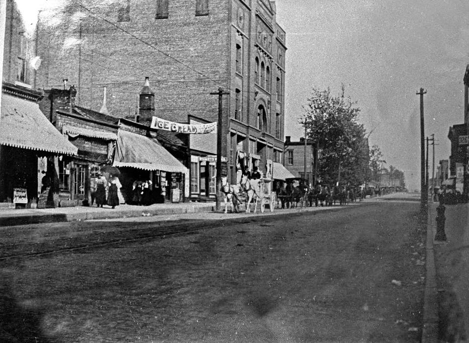 mainstreet, Ottumwa, IA, Iowa, Animals, storefront, veranda, horse and buggy, Lemberger, LeAnn, Cities and Towns, Businesses and Factories, history of Iowa, Main Streets & Town Squares, Iowa History