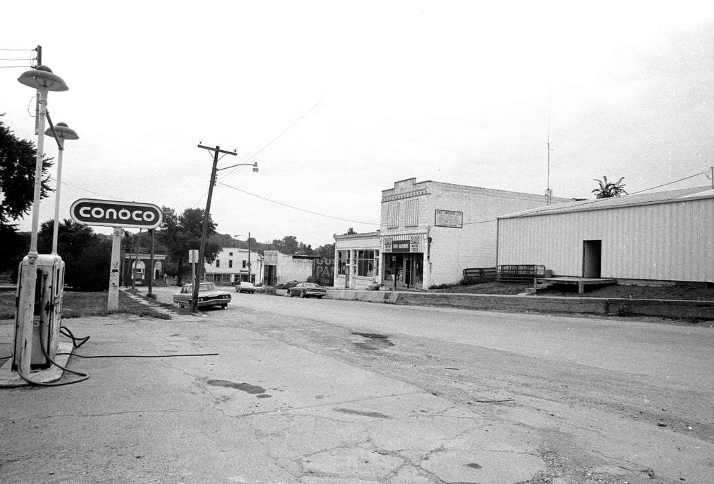 telephone pole, Main Streets & Town Squares, history of Iowa, Iowa History, Lemberger, LeAnn, storefront, Motorized Vehicles, Businesses and Factories, car, Melrose, IA, gas station, Iowa, Cities and Towns, sign, gas pump