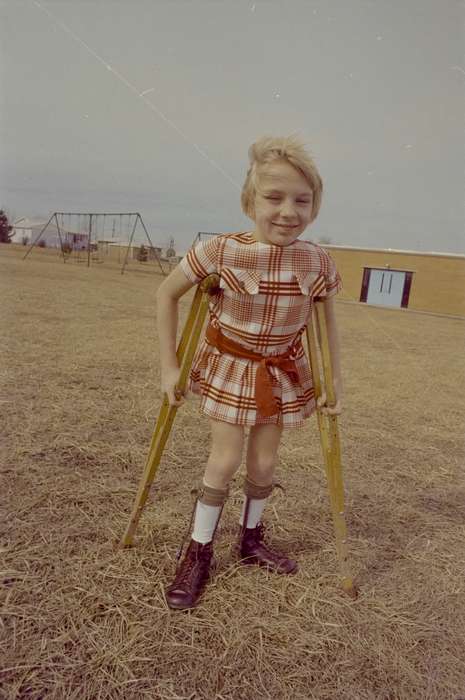 crutches, Portraits - Individual, Iowa History, Iowa, Lemberger, LeAnn, Ottumwa, IA, playground, dress, Children, history of Iowa