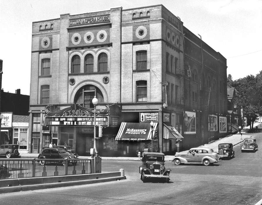 Cities and Towns, opera house, marquee, Iowa, architecture, Lemberger, LeAnn, bust, Entertainment, opera, Main Streets & Town Squares, coca cola, intersection, history of Iowa, Businesses and Factories, car, Iowa History, Motorized Vehicles, automobile, venue, Ottumwa, IA