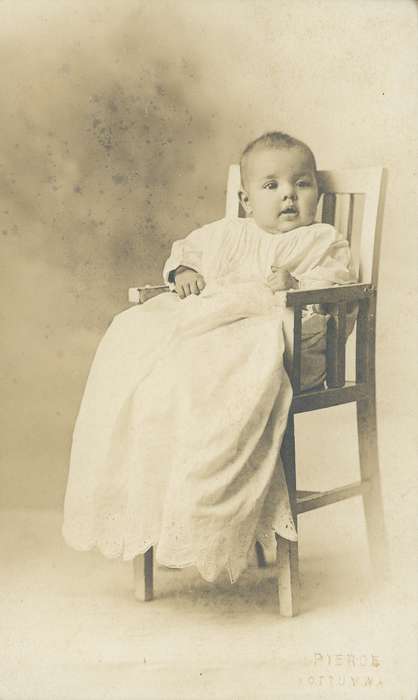 baby, infant, Iowa History, Children, Iowa, history of Iowa, photo studio, Portraits - Individual, backdrop, Ottumwa, IA, chair, wooden chair, Spilman, Jessie Cudworth