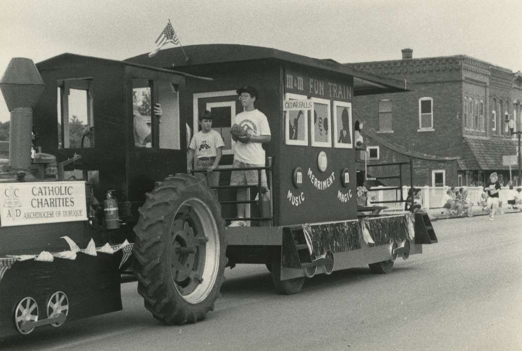 baseball bat, Fairs and Festivals, parade float, child, Waverly, IA, history of Iowa, Motorized Vehicles, brick building, american flag, Main Streets & Town Squares, Iowa, Waverly Public Library, baseball glove, Children, Entertainment, Iowa History, tractor