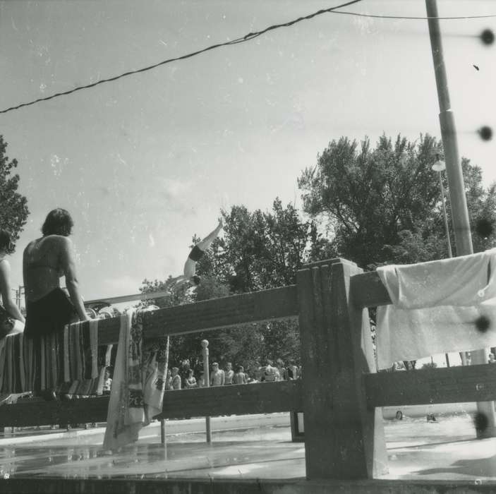 history of Iowa, swimming pool, young woman, Waverly Public Library, Iowa, towel, wooden fence, Outdoor Recreation, Iowa History, pool