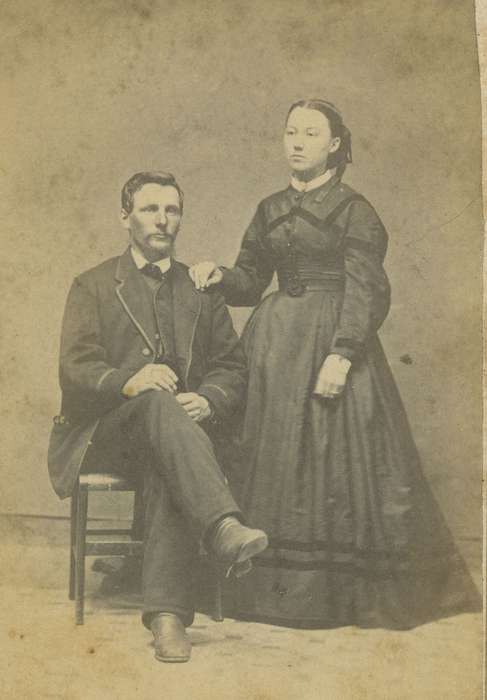 sack coat, woman, hoop skirt, Marion, IA, man, bow tie, history of Iowa, ribbon, Iowa History, Portraits - Group, carte de visite, Iowa, vest, couple, bishop sleeves, Olsson, Ann and Jons, dress, hairnet, collared dresses, dropped shoulder seams