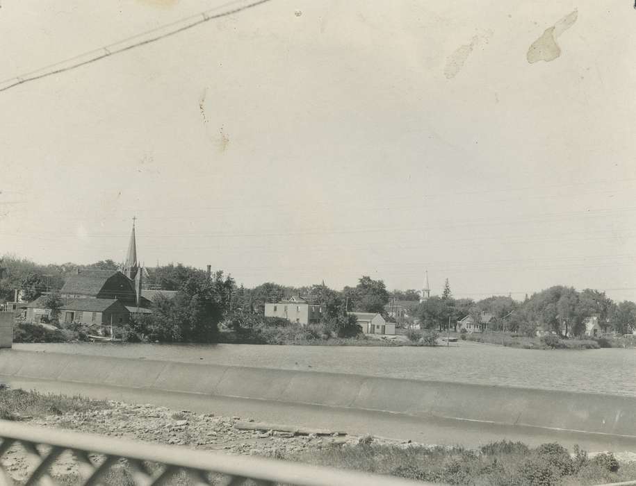 riverbank, history of Iowa, Iowa History, Lakes, Rivers, and Streams, Waverly, IA, cedar river, Iowa, Landscapes, church, house, Waverly Public Library, dam