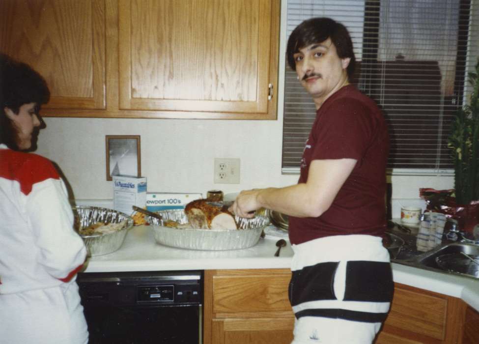 christmas, turkey, kitchen, history of Iowa, Iowa History, Families, Roumfort, Laurie, Holidays, Muscatine, IA, Iowa, carving, Homes, Food and Meals, Portraits - Individual