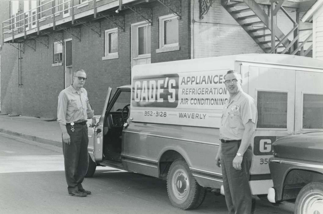 Portraits - Group, uniform, Families, truck, Businesses and Factories, glasses, man, delivery truck, air conditioner, Waverly Public Library, fridge, Iowa History, history of Iowa, Motorized Vehicles, Waverly, IA, Iowa, appliance, refrigerator, Labor and Occupations