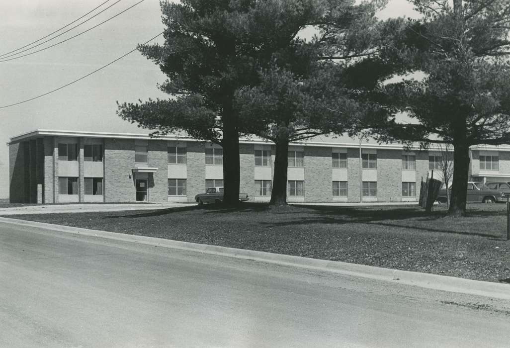 history of Iowa, Iowa History, Motorized Vehicles, nursing home, pine trees, brick building, car, Hospitals, Iowa, Cities and Towns, Homes, correct date needed, Waverly Public Library