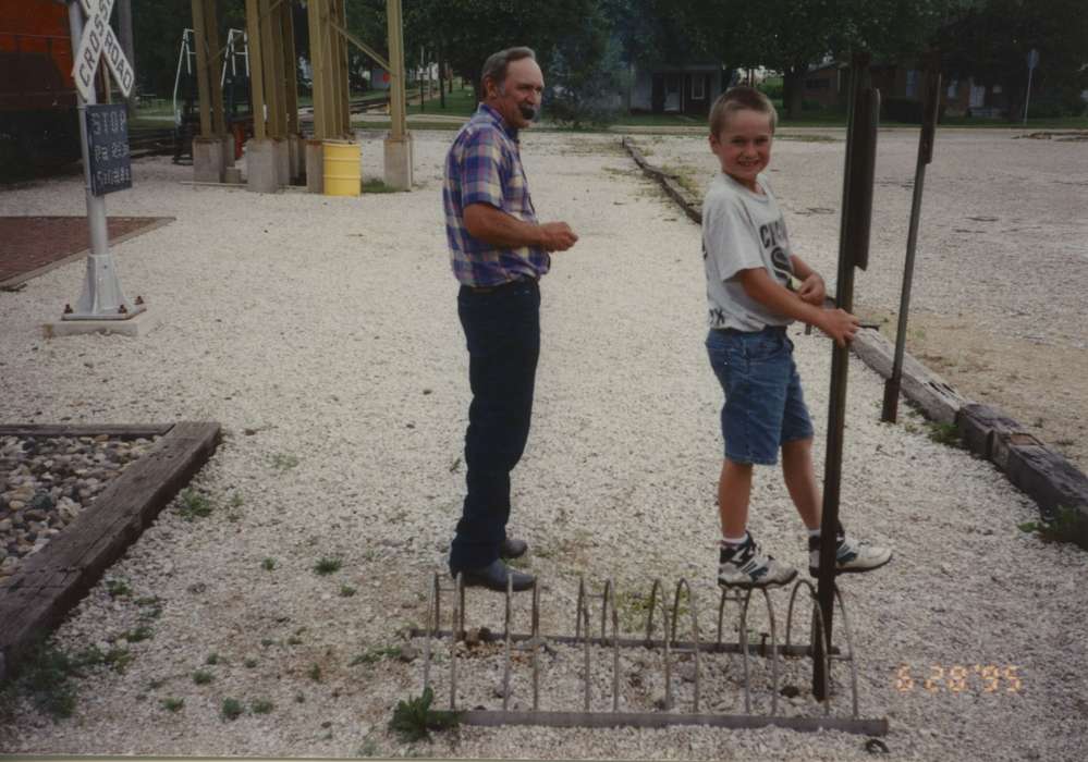 Boone, IA, history of Iowa, Iowa History, Families, Tackett, Lyn, parking lot, railroad, Iowa, Children, gravel