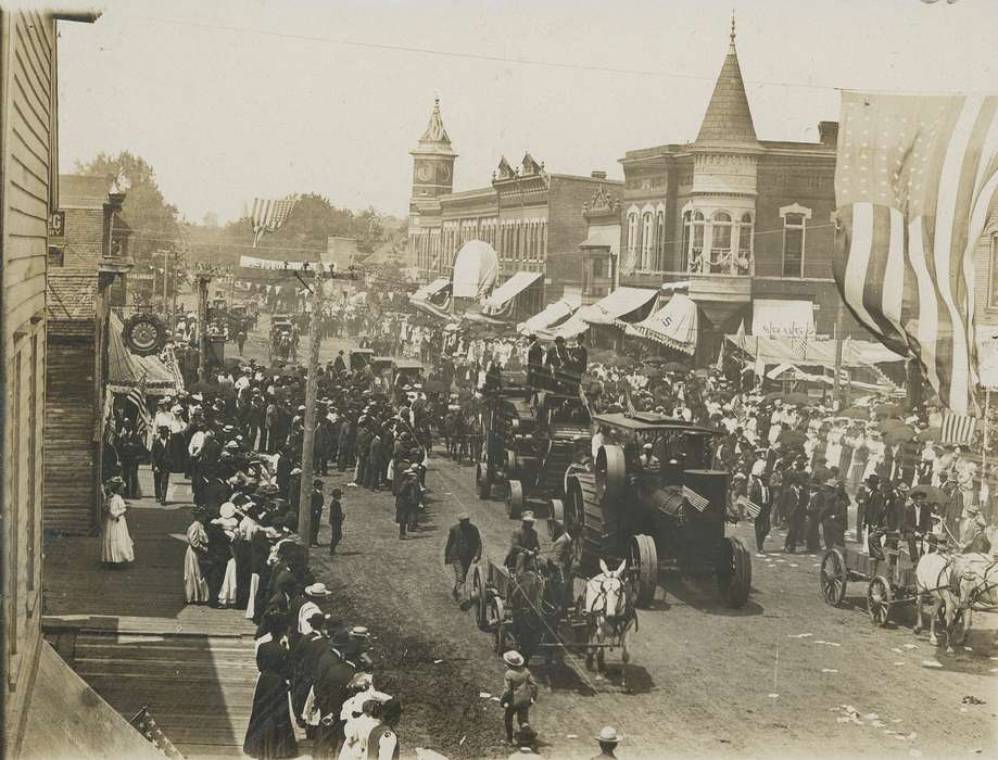 parade, buggy, Businesses and Factories, Animals, clock tower, american flag, steam engine, umbrella, Cities and Towns, horse, banner, Waverly Public Library, electrical pole, Main Streets & Town Squares, history of Iowa, Iowa History, Entertainment, Motorized Vehicles, brick building, clock, crowd, Aerial Shots, Iowa, correct date needed