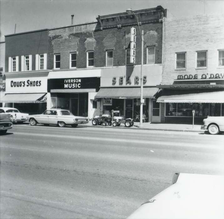 Iowa History, Waverly Public Library, Iowa, storefront, street, shoe store, Cities and Towns, department store, history of Iowa, music store, clothing store