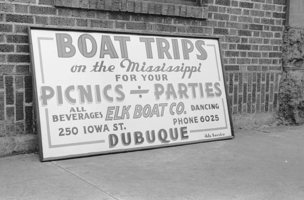 Library of Congress, sign, history of Iowa, boat trip advertisement, sidewalk, Iowa, mississippi river, advertisement, brick building, Iowa History, Cities and Towns