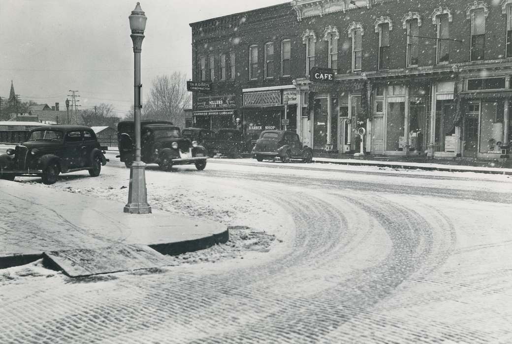 Main Streets & Town Squares, history of Iowa, Iowa History, storefront, Motorized Vehicles, Businesses and Factories, lamp post, downtown, car, Waverly, IA, street light, cafe, Iowa, Cities and Towns, leather shop, snow, barbershop, Waverly Public Library