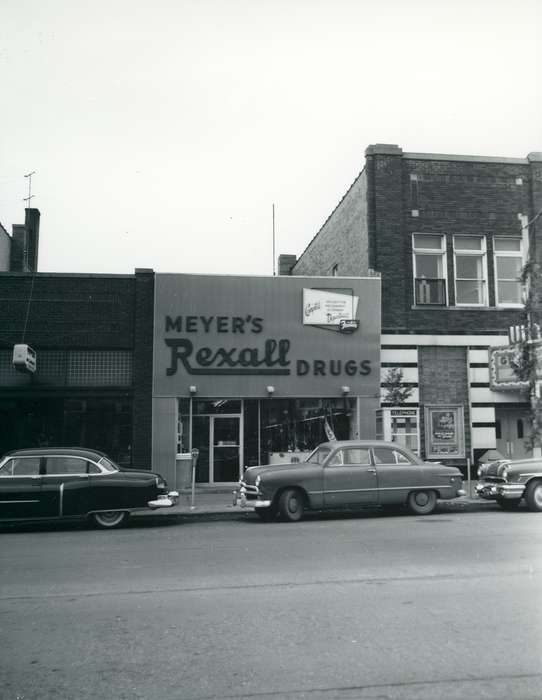 history of Iowa, stores, Waverly Public Library, drugstore, Main Streets & Town Squares, storefront, main street, Iowa, street, Iowa History, Cities and Towns, cars