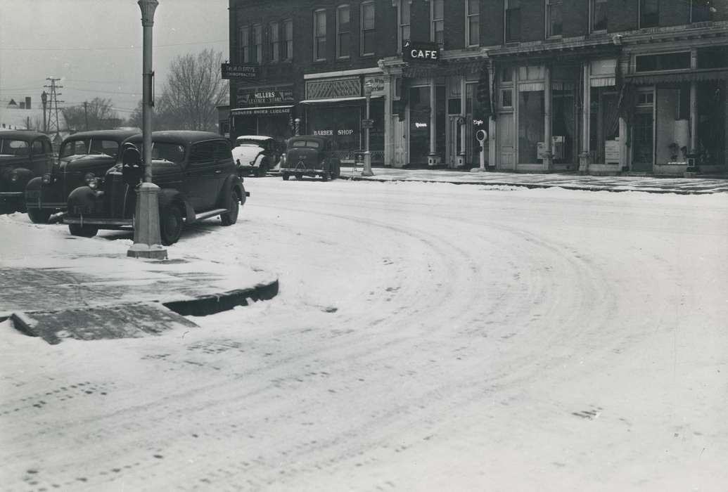 history of Iowa, Businesses and Factories, snow, Waverly, IA, Main Streets & Town Squares, Iowa, car, Motorized Vehicles, cafe, power line, Waverly Public Library, Winter, barbershop, Iowa History, street light, leather shop