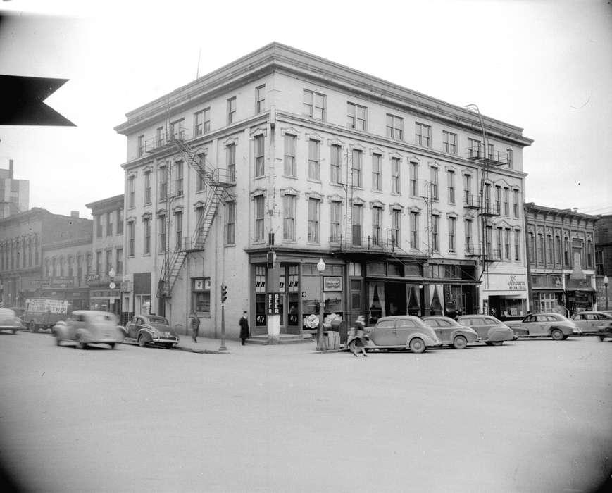 Main Streets & Town Squares, fire escape, history of Iowa, Iowa History, Ottumwa, IA, Lemberger, LeAnn, Motorized Vehicles, Businesses and Factories, car, Iowa, Cities and Towns, intersection, hotel