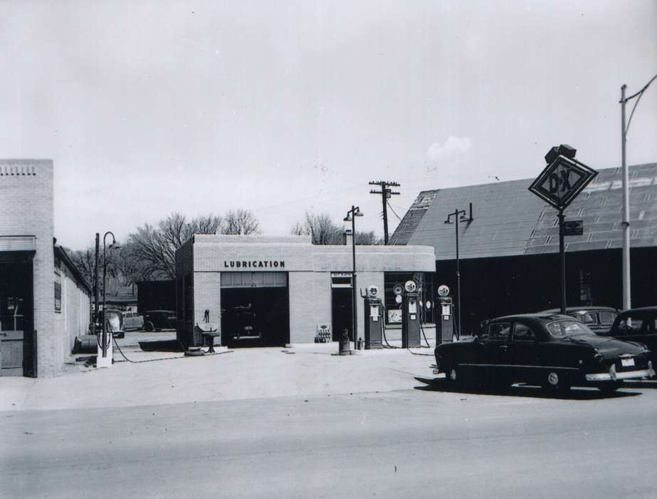 Waverly, IA, history of Iowa, Motorized Vehicles, brick building, Main Streets & Town Squares, Iowa, Cities and Towns, car, sign, Waverly Public Library, Businesses and Factories, building, gas station, gas pump, Iowa History