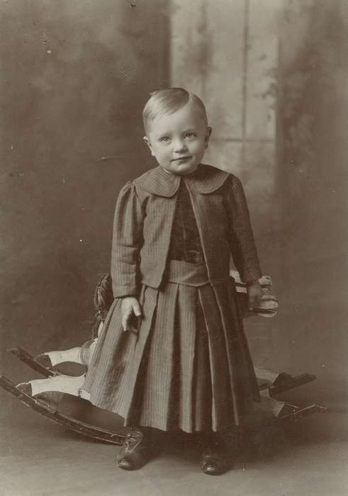 Lost Nation, IA, Portraits - Individual, Olsson, Ann and Jons, rocking horse, Iowa History, Iowa, painted backdrop, pleats, cabinet photo, boy, history of Iowa