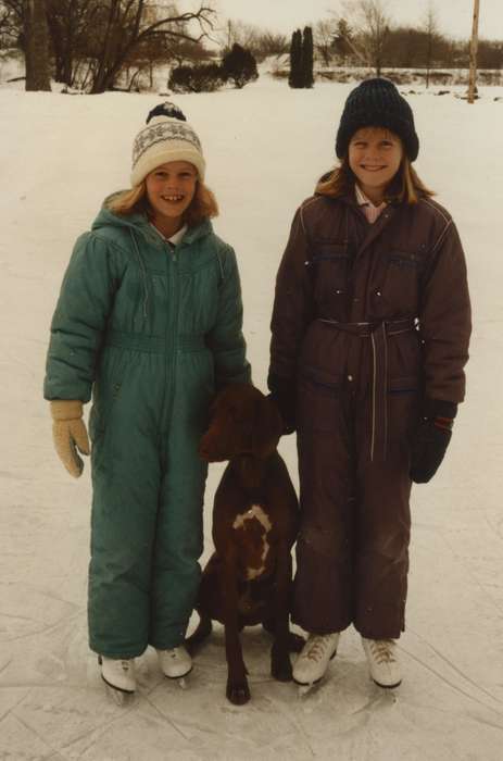 Outdoor Recreation, Portraits - Group, ice, Iowa, Animals, Kann, Rodney, ice skating, Mason City, IA, dog, Leisure, Children, snowsuit, girl, history of Iowa, snow, Iowa History, ice skates