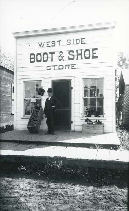 Main Streets & Town Squares, shoe store, history of Iowa, Iowa History, storefront, Businesses and Factories, Waverly, IA, dirt road, wood sidewalk, Iowa, Cities and Towns, cobbler, Waverly Public Library, Labor and Occupations