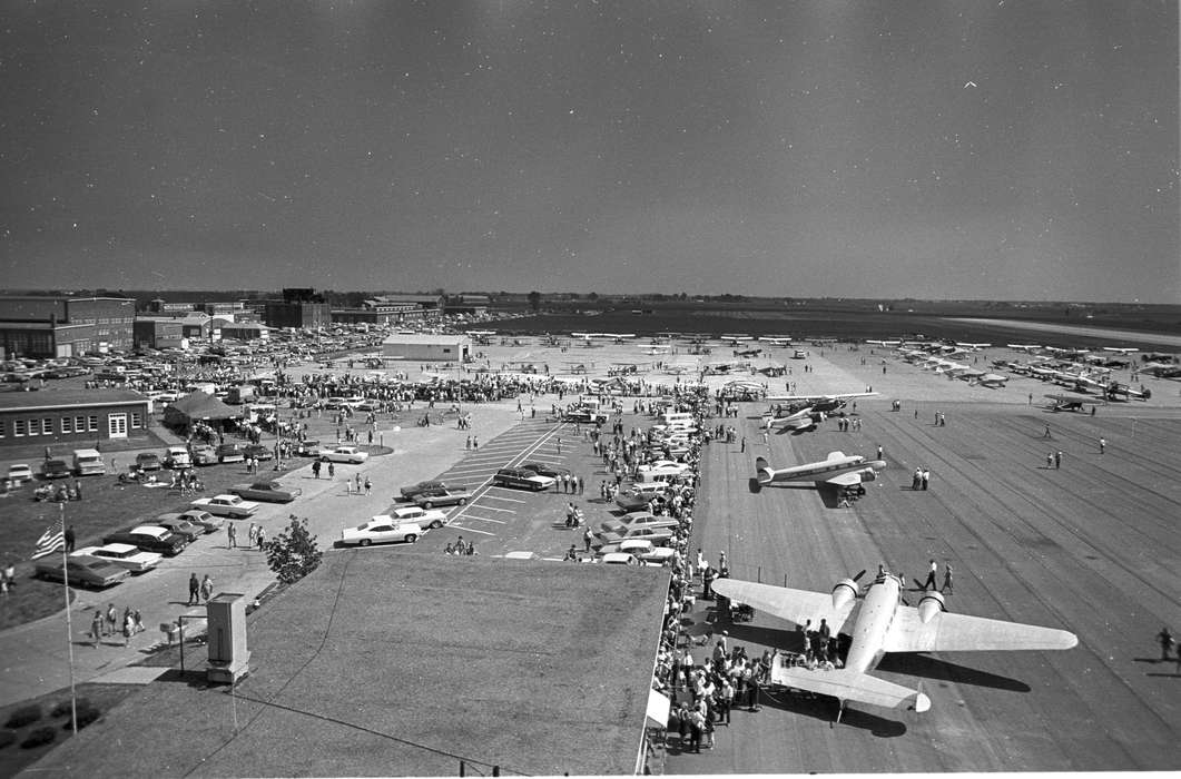 car, Iowa History, Iowa, Motorized Vehicles, parking lot, Lemberger, LeAnn, Ottumwa, IA, plane, airplane, Aerial Shots, history of Iowa