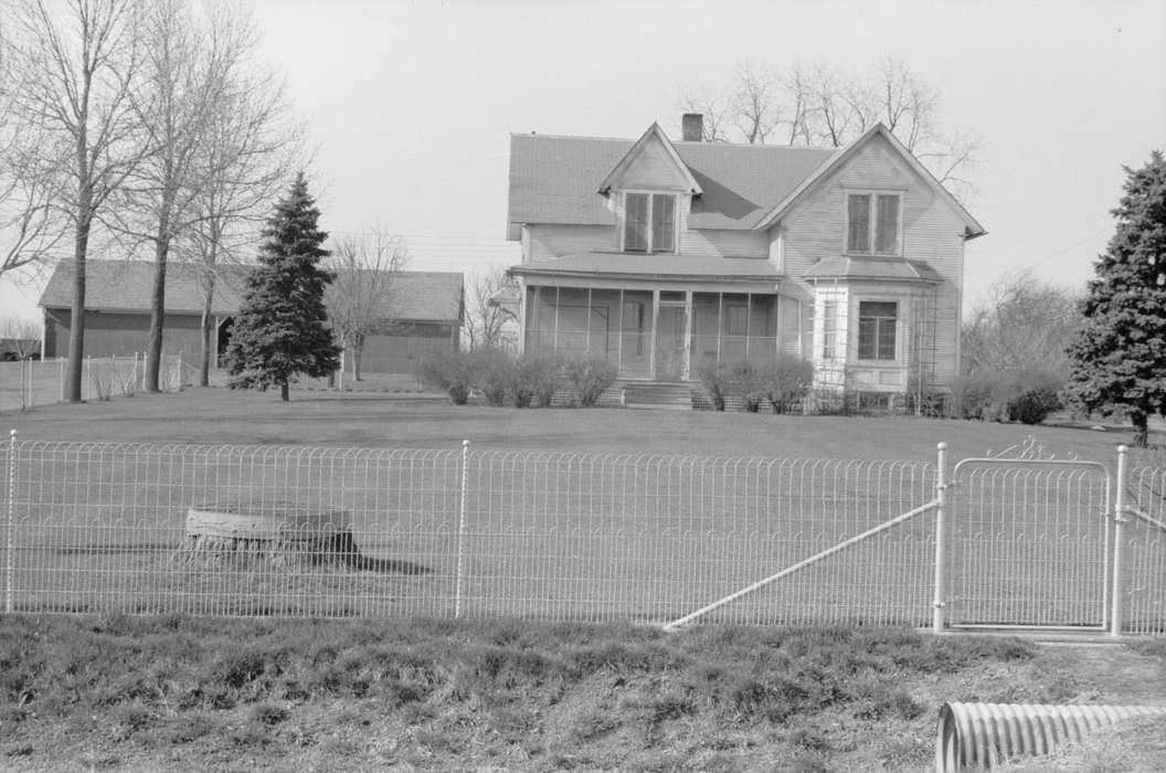 Library of Congress, culvert, history of Iowa, Landscapes, front porch, yard fence, Iowa, farmhouse, Barns, front yard, Farms, Iowa History, bushes, pine trees, tree