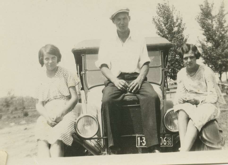 Portraits - Group, IA, Iowa, ford, girls, McVey, Michael and Tracy, car, license plate, women, man, history of Iowa, Motorized Vehicles, Iowa History, automobile