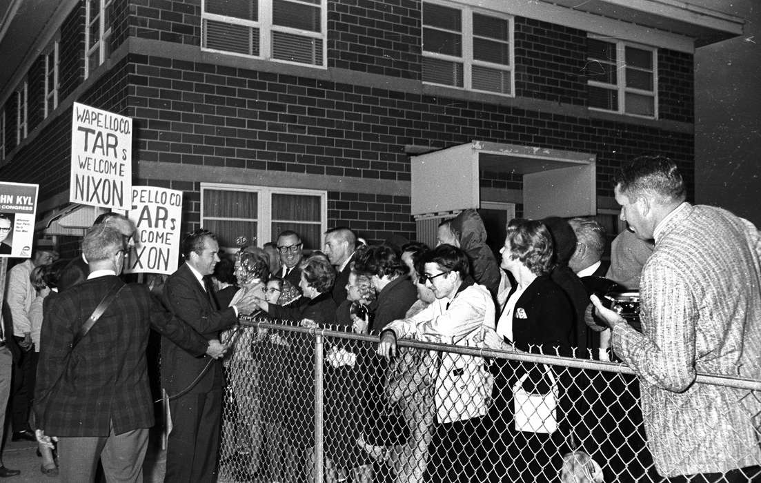 history of Iowa, Iowa History, Ottumwa, IA, Lemberger, LeAnn, Families, Civic Engagement, photographer, crowd, president, richard nixon, nixon, Iowa, fence, sign, Children