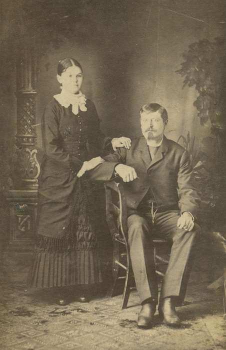 Portraits - Group, sack coat, carte de visite, Iowa, couple, woman, Olsson, Ann and Jons, history of Iowa, Reinbeck, IA, painted backdrop, lace collar, collared dresses, mustache, goatee, Iowa History, man