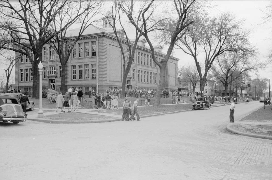 Library of Congress, Children, high school, history of Iowa, Iowa, car, Motorized Vehicles, newton high school, trees, lamppost, cobblestone street, Iowa History, Schools and Education, intersection, ford model a, student, automobile