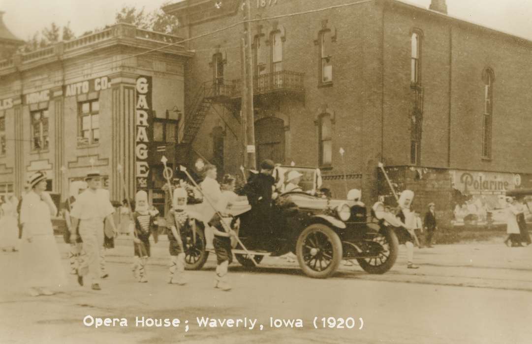 opera house, Iowa, parade, fire escape, garage, Iowa History, Children, straw hat, Meyer, Sarah, car, Entertainment, Cities and Towns, Waverly, IA, Civic Engagement, history of Iowa, Motorized Vehicles, Main Streets & Town Squares, costume