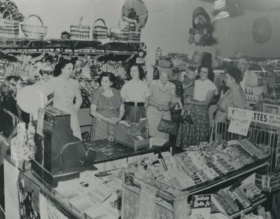 adding machine, history of Iowa, produce, Businesses and Factories, grocery store, baskets, Waverly, IA, Iowa, Waverly Public Library, candy, apple, Iowa History, women, correct date needed, cash register, bananas, fruit, halloween