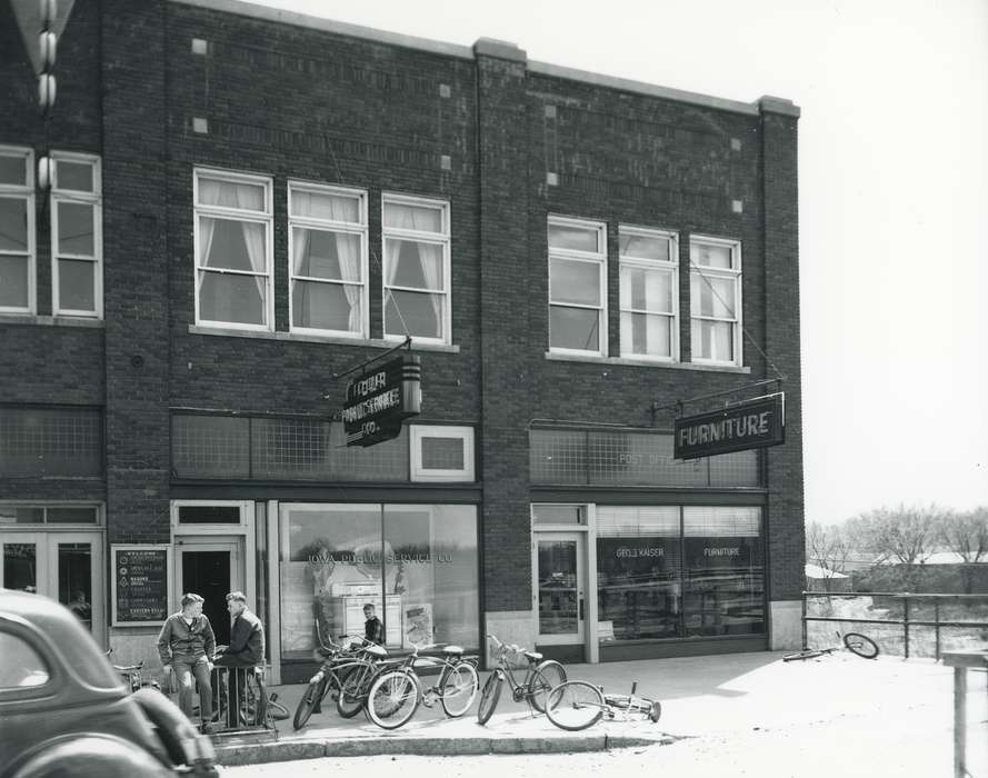 Waverly, IA, history of Iowa, window display, brick building, bicycle, Main Streets & Town Squares, window, Iowa, Cities and Towns, sign, Waverly Public Library, Businesses and Factories, building, Children, bike, Iowa History