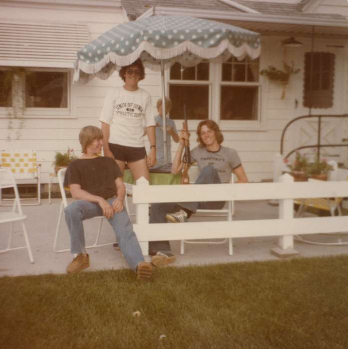 gun, history of Iowa, porch, umbrella, Washington, IA, Iowa, Edmund, Sharon, Iowa History, rifle, man, Leisure