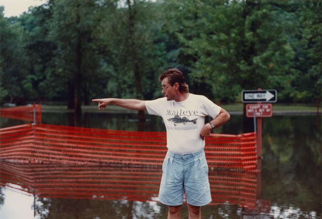 Floods, history of Iowa, Iowa History, Lakes, Rivers, and Streams, Merck, Linda, river, man, Central City, IA, fence, Iowa, Portraits - Individual