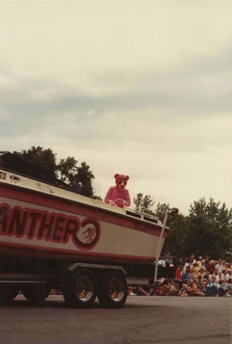 Portraits - Group, Iowa, parade, Fairs and Festivals, Families, boat, Children, pink panther, Clear Lake, IA, history of Iowa, Bancroft, Cynthia, Motorized Vehicles, Iowa History