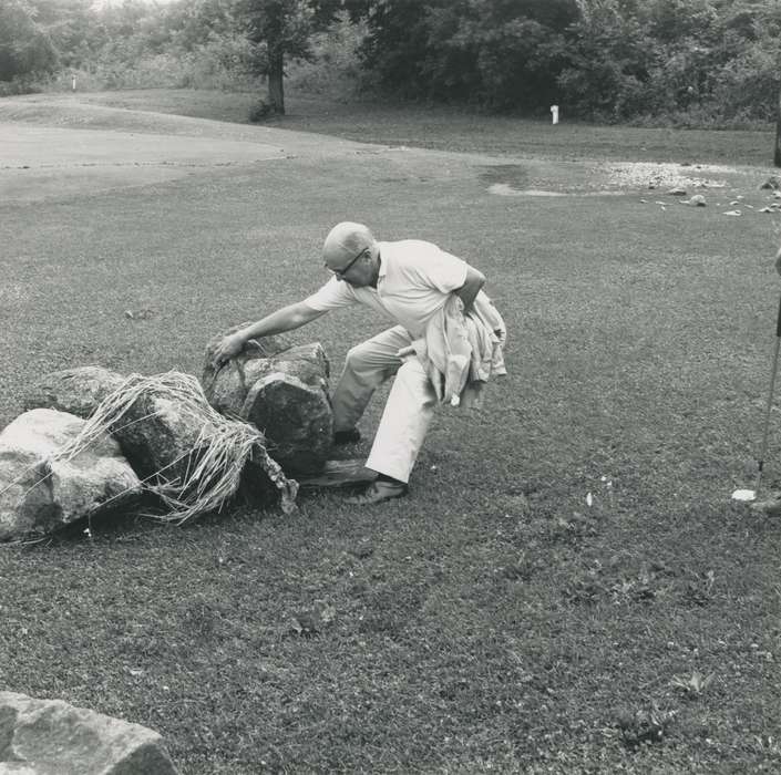 Floods, history of Iowa, Iowa History, summer, flood aftermath, golf club, rock, glasses, Waverly, IA, man, Iowa, tree, Waverly Public Library, Labor and Occupations