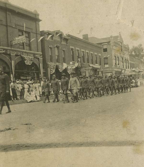 military, mainstreet, Iowa, parade, storefront, Military and Veterans, procession, Anamosa, IA, Hatcher, Cecilia, drugstore, history of Iowa, flag, Main Streets & Town Squares, Iowa History