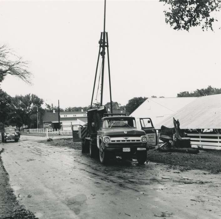 summer, history of Iowa, Waverly Public Library, Waverly, IA, Iowa, Motorized Vehicles, fence, debris, wooden fence, stop sign, Floods, Iowa History, flood aftermath, truck