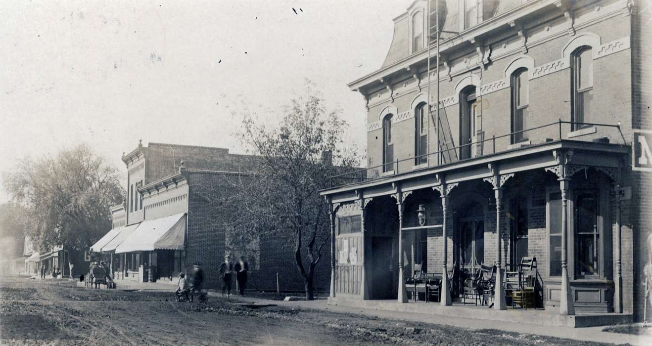 Lemberger, LeAnn, Cities and Towns, storefront, veranda, Iowa History, Iowa, history of Iowa, Businesses and Factories, chair, mainstreet, horse and buggy, Brighton, IA, Main Streets & Town Squares