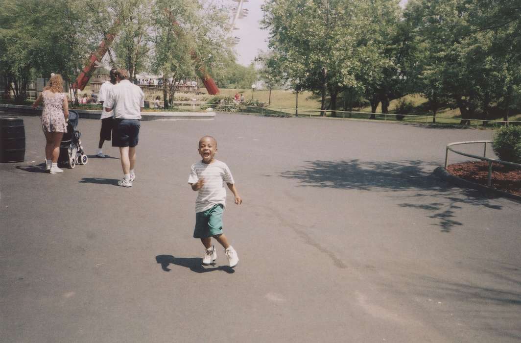 boy, run, Altoona, IA, adventureland, Iowa, Barrett, Sarah, laughter, Leisure, Children, african american, People of Color, history of Iowa, Iowa History