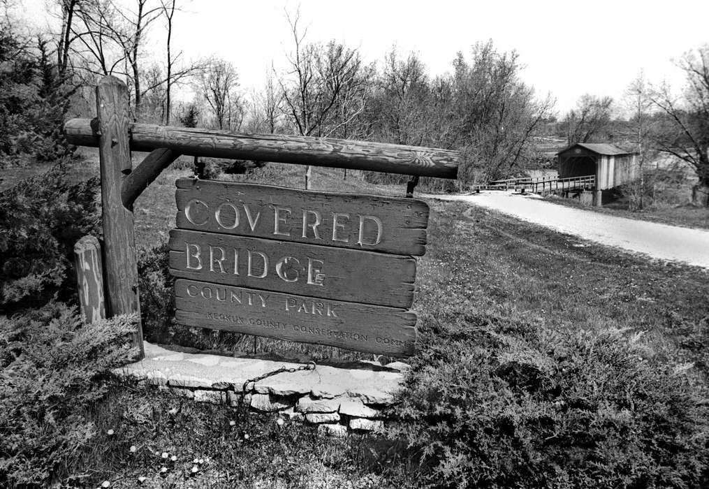 history of Iowa, Lemberger, LeAnn, bridge, covered bridge, Iowa, sign, Landscapes, Delta, IA, Iowa History, gravel road