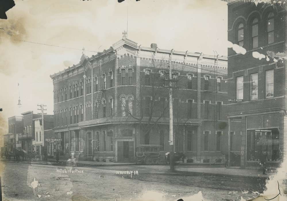 hotel, Waverly, IA, history of Iowa, brick building, Main Streets & Town Squares, Animals, Iowa, Cities and Towns, sign, Waverly Public Library, Businesses and Factories, building, horse, Iowa History, road