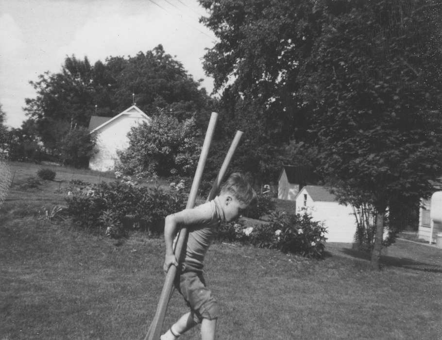 Children, Iowa History, tree, Iowa, lawn, Karns, Mike, Entertainment, Anita, IA, stilts, boy, history of Iowa