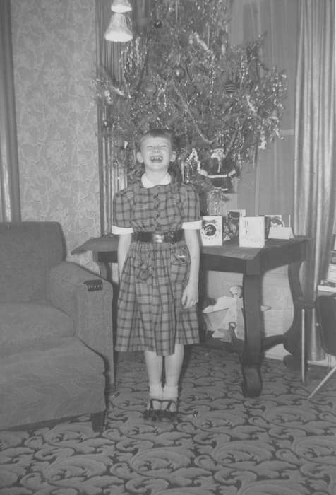 Mallow, Christine, Iowa, Children, living room, Homes, Portraits - Individual, history of Iowa, christmas, laughing, christmas tree, rug, Sioux City, IA, Holidays, Iowa History