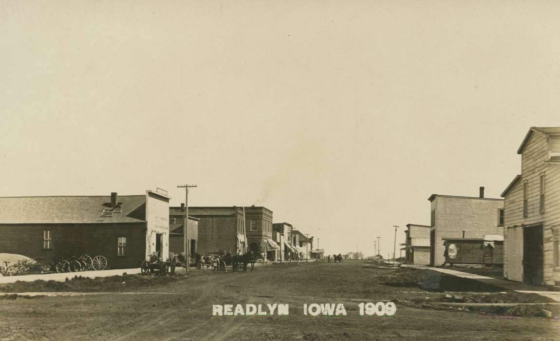 Main Streets & Town Squares, mud, history of Iowa, horse, Iowa History, road, Animals, store, dirt street, Readlyn, IA, Marvets, Peggy, Iowa, Cities and Towns, shop, street