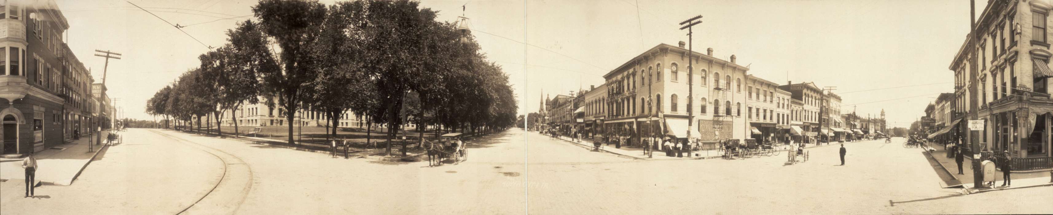 pedestrian, mailbox, horse and cart, pentacrest, trolley tracks, horse, power lines, street corner, Businesses and Factories, Iowa History, Leisure, trees, Cities and Towns, Animals, brick building, electrical pole, Main Streets & Town Squares, Library of Congress, horse and buggy, intersection, Iowa, history of Iowa, cobblestone street, Portraits - Group