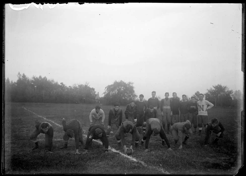 Storrs, CT, uniform, history of Iowa, men, Iowa, field, Archives & Special Collections, University of Connecticut Library, football, Iowa History, team