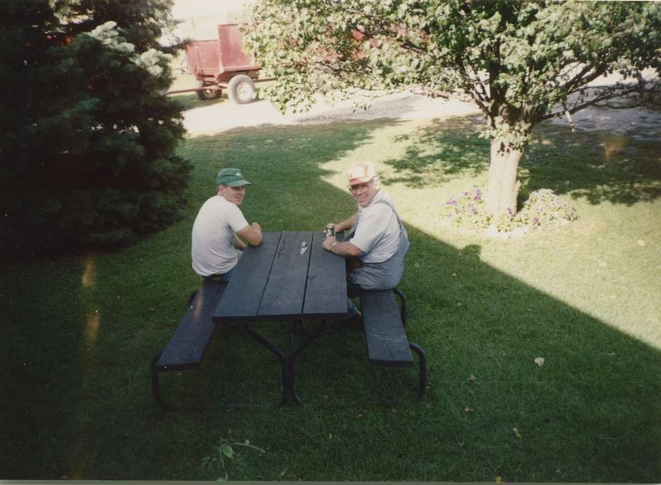 Portraits - Group, picnic table, Iowa History, Pfeiffer, Jean, Iowa, farm equipment, IA, Farms, Leisure, history of Iowa